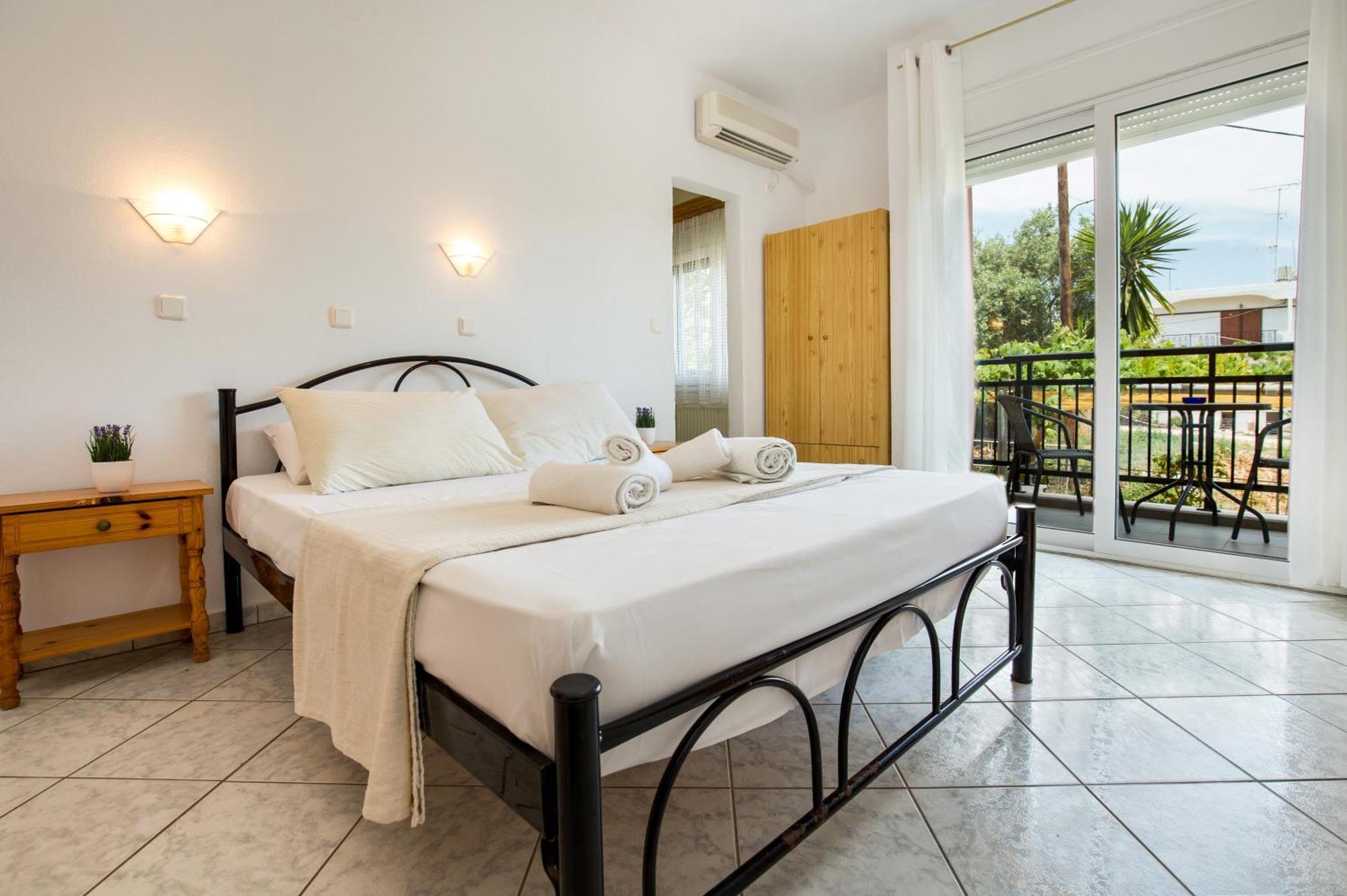 Ianos Apartments Potos Bagian luar foto